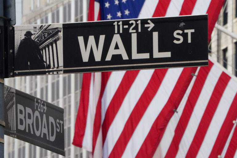 The wall street sign is pictured at the new york stock exchange (nyse) in the manhattan borough of new york city